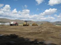 Working on the building pad.